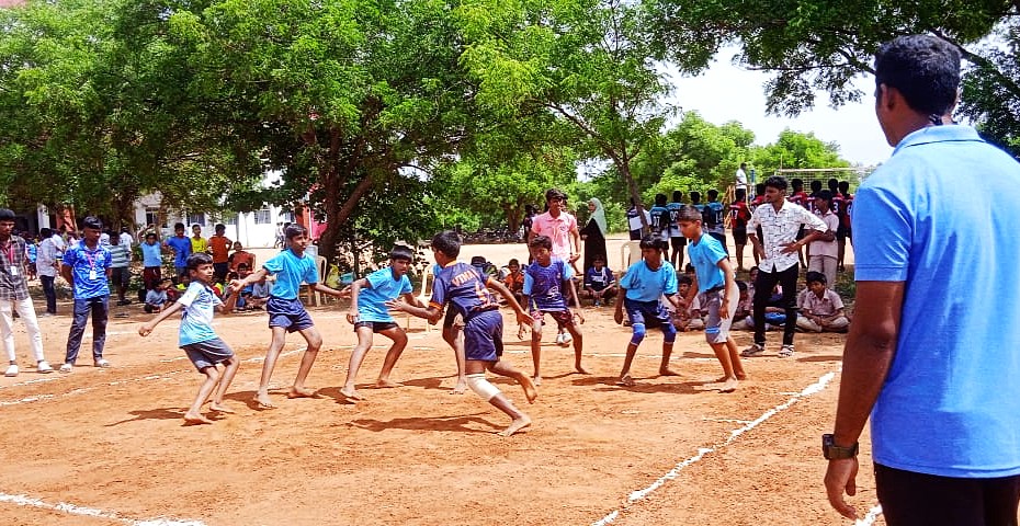Teacher with students